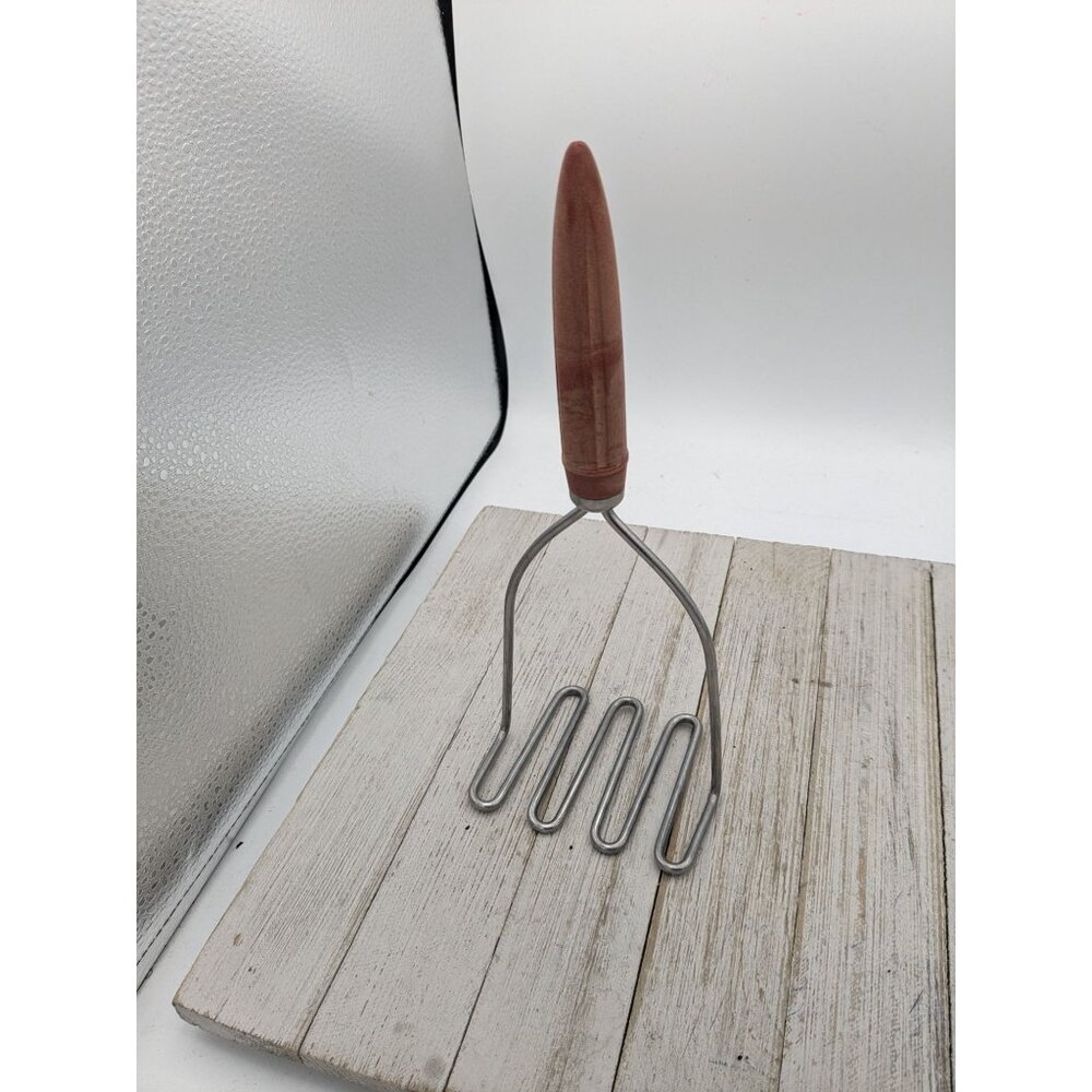 Vintage Potato Vegetable Masher Red Bullet Handle Utensil 10 1/2"